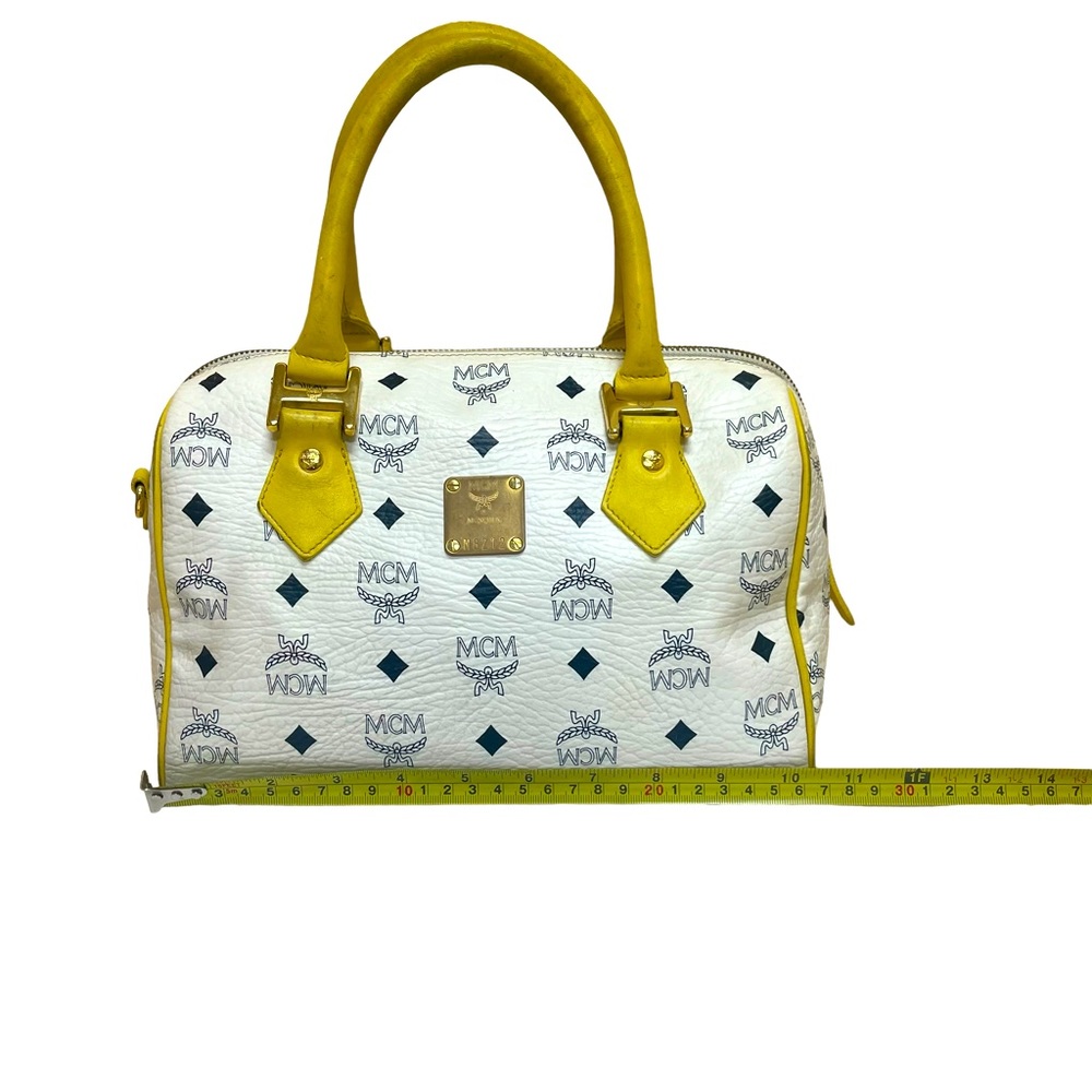 Auth.MCM Preowned Boston Doctor’s bag.it’s beautiful canvas/leather w/ dust bag.
